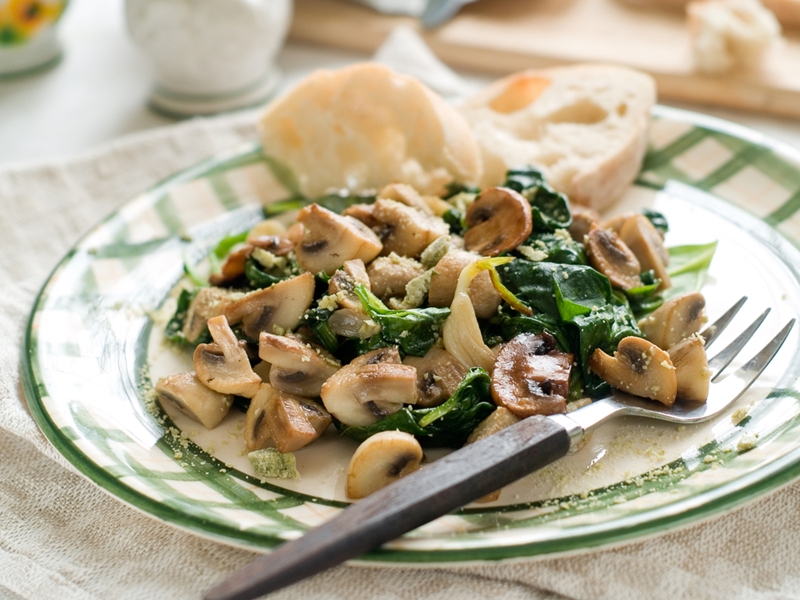 Mushroom and spinach mix on plate.