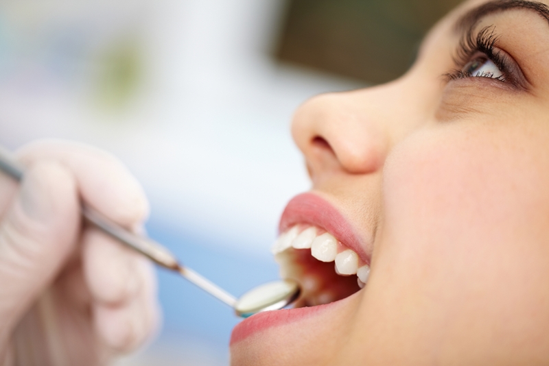 Regular dental exams are crucial for fighting halitosis.