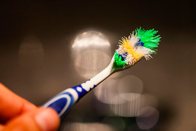 flattened toothbrush